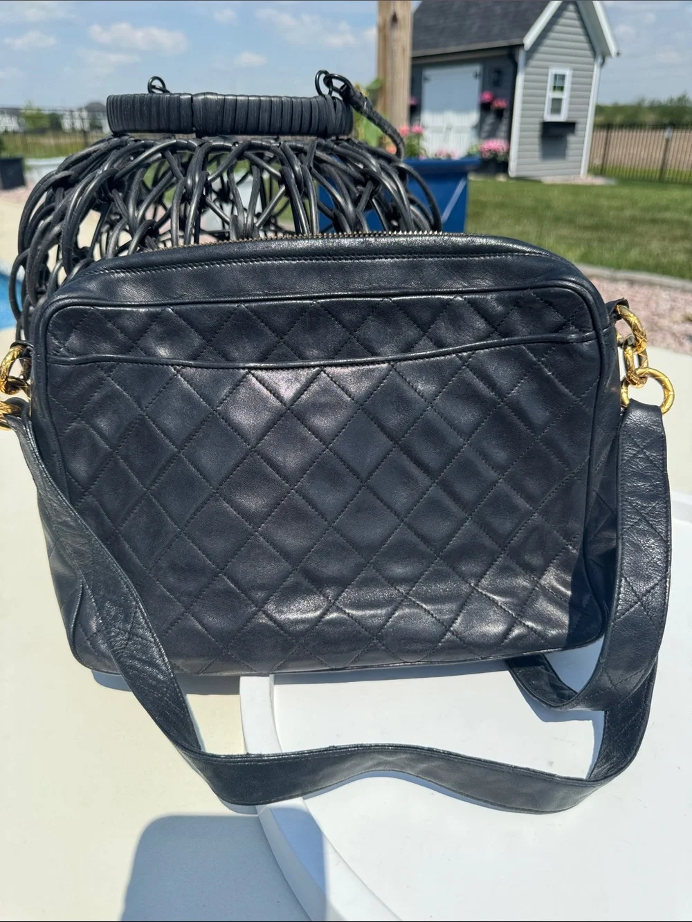 CHANEL Black Quilted Leather Shoulder Baguette with Embossed CC